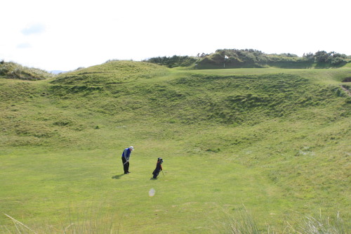 Tom Cade prays for an up-and-down from the hollow of the Mass Hole at Waterville Golf Links.