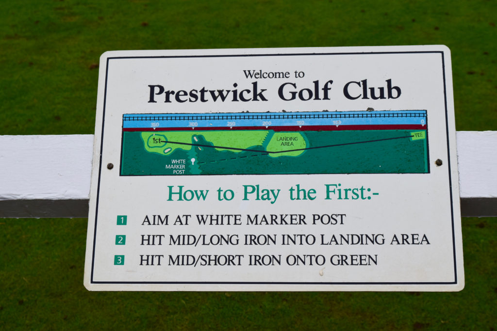 Golfers need to play smartly on the par 4 No. 1 hole at Prestwick, with a wall and railroad tracks right, and rough left.