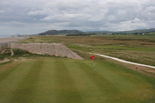 The 12th green, and view beyond, at Aberdovey Golf Club, Wales.