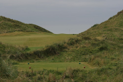 The fifth hole at Trump International Doonbeg requires a shot through a narrow valley between the dunes.