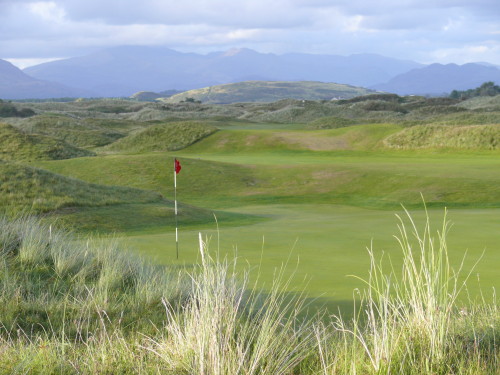 The 15th green and fairway, a signature hole at Royal St. David's Golf Club in North Wales.