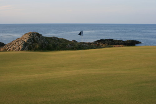 The fourteenth green (No. 5 Old Course) at Nefyn & District Golf Club in North Wales.