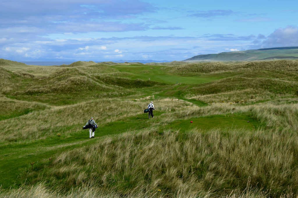 Tom Cade and Rob Perry, amid the dunes on the eighth hole at Machrihanish Golf Club in Scotland.
