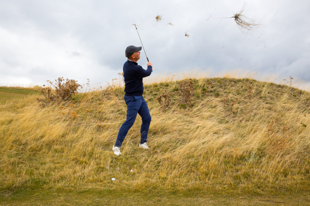 David McLay Kidd hits balls on Tetherow's practice range. (Carl Davaz)